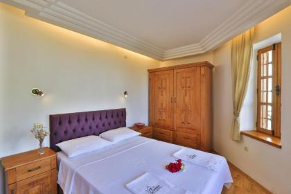 Kaş merkezde deniz manzaralı 4 kişilik aile evleri - image 14