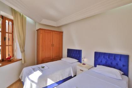 Kaş merkezde deniz manzaralı 4 kişilik aile evleri - image 5