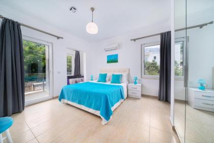 5 bedrooms villa with sea view private pool and terrace at Kalkan 1 km away from the beach - image 13