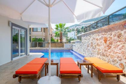 5 bedrooms villa with sea view private pool and terrace at Kalkan 1 km away from the beach - image 8
