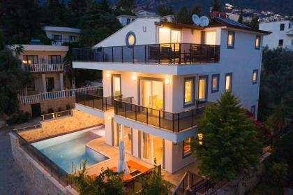5 bedrooms villa with sea view private pool and terrace at Kalkan 1 km away from the beach - image 9