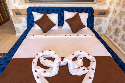 Kalkan'da 2 Yatak Odalı Jakuzili Villa-Villa Seabird - image 21