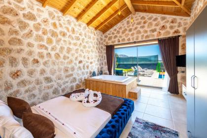 Kalkan'da 2 Yatak Odalı Jakuzili Villa-Villa Seabird - image 22