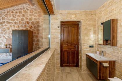 Kalkan'da 2 Yatak Odalı Jakuzili Villa-Villa Seabird - image 23