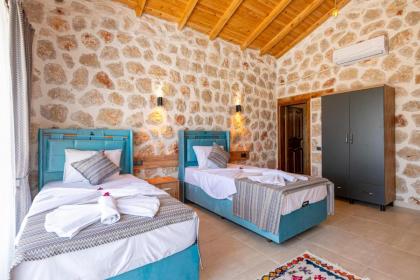 Kalkan'da 2 Yatak Odalı Jakuzili Villa-Villa Seabird - image 26