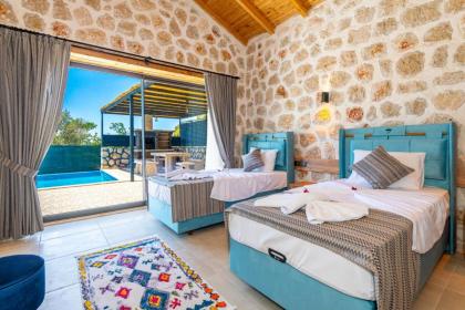Kalkan'da 2 Yatak Odalı Jakuzili Villa-Villa Seabird - image 28