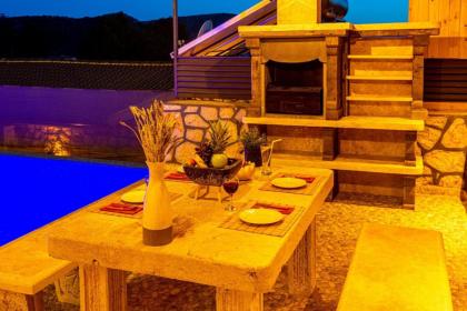 Kalkan'da 2 Yatak Odalı Jakuzili Villa-Villa Seabird - image 30