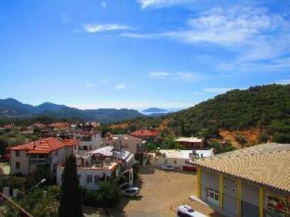 Yiğit apart with a terrace in sea and mountains