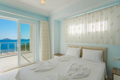 Kalkan'da Denize Sıfır Geniş Lüks Villa-Özel Plaj - image 22