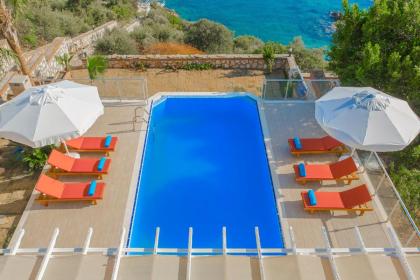 Kalkan'da Denize Sıfır Geniş Lüks Villa-Özel Plaj - image 23