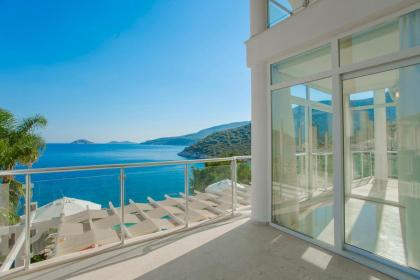 Kalkan'da Denize Sıfır Geniş Lüks Villa-Özel Plaj - image 27