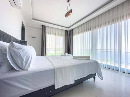 Kalkan'da Deniz Manzaralı Villa - image 26