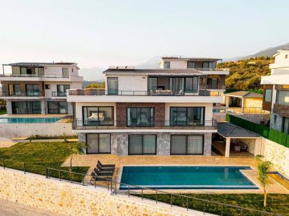 Kalkan'da Deniz Manzaralı Villa - image 29