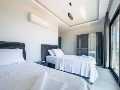 Kalkan'da Deniz Manzaralı Villa - image 6