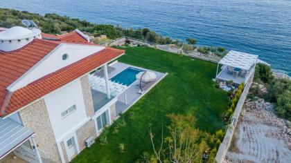 Kalkan Kalamar Koyunda Denize Özel Platformu Olan Eşsiz Villa Elana - image 24